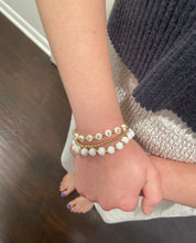 Load image into Gallery viewer, close up on wrist warrior bracelet