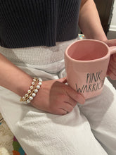 Load image into Gallery viewer, Warrior bracelet set holding mug
